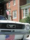 A Mustang parked in front -- the American dream.